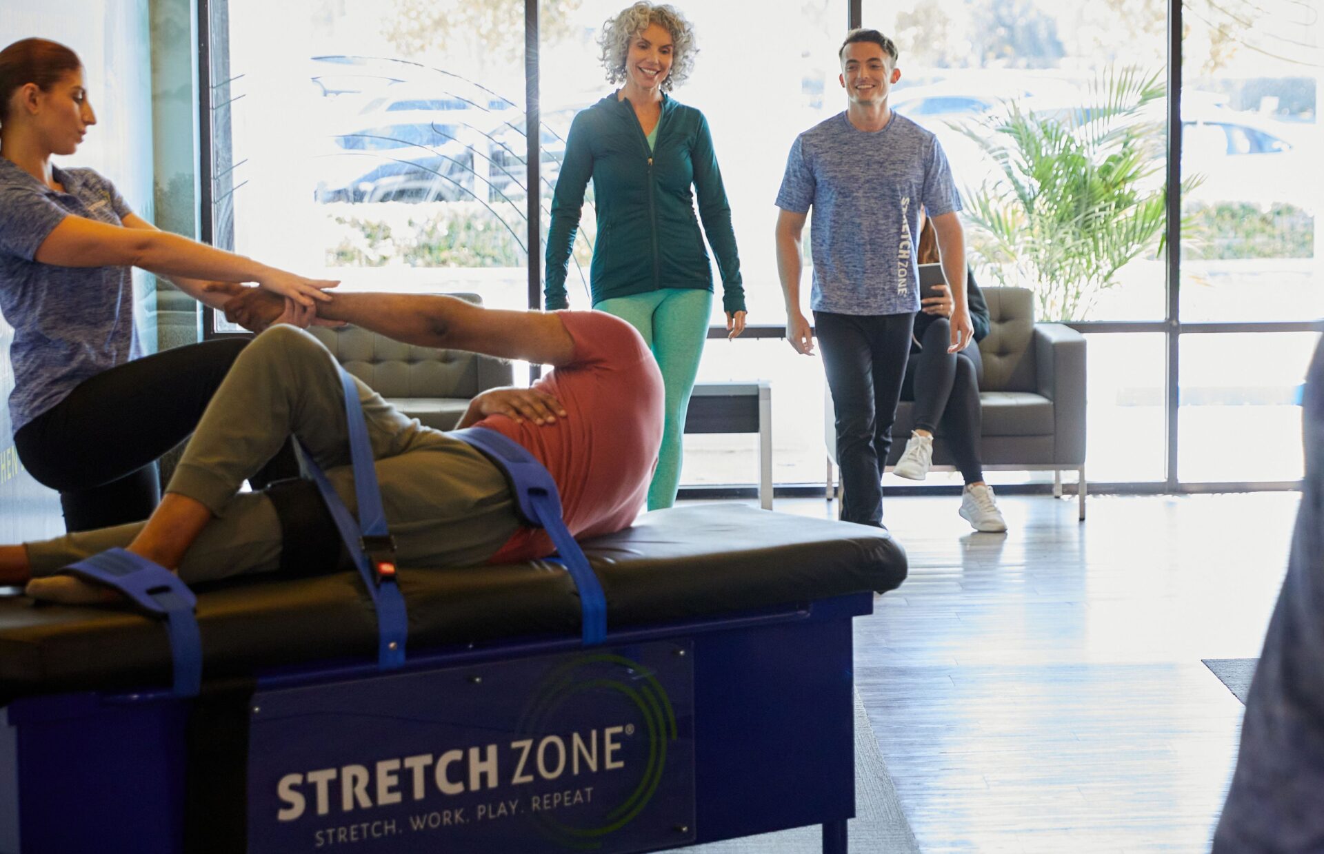 man stretching Stretch Zone